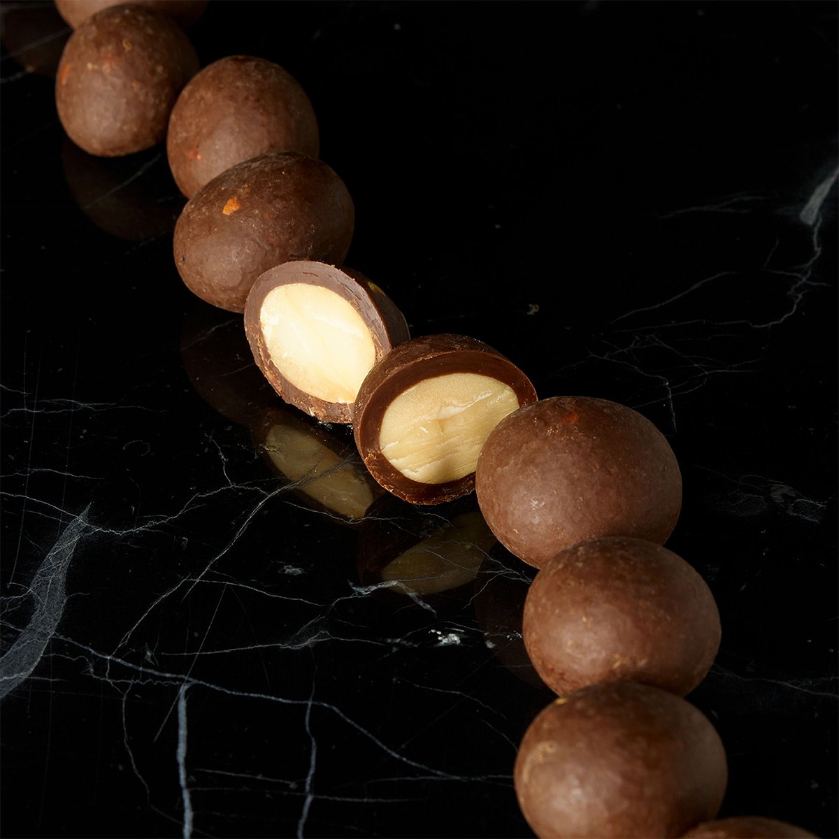 Panthère Nue Macadamia Nüsse Darc Choc Chilli 100g 